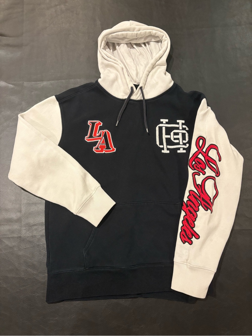 Hollister Black Pullover Hoodie with White Sleeves and Red Script